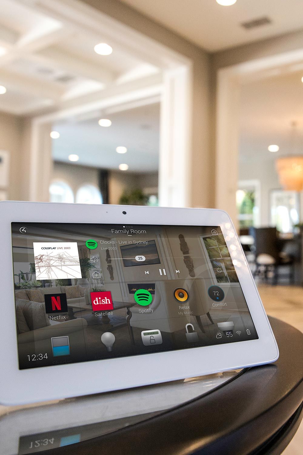 Smart home control panel displaying various applications in a contemporary living room.