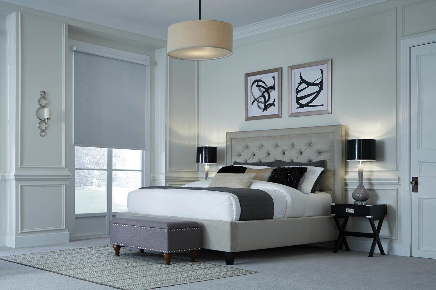 Minimalist bedroom with motorized window shades, a cozy bed, and soft lighting.